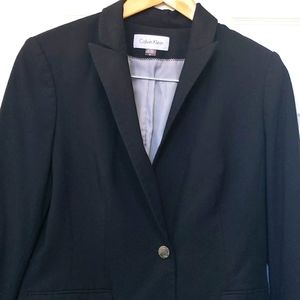 Calvin Klein black one button suit jacket.